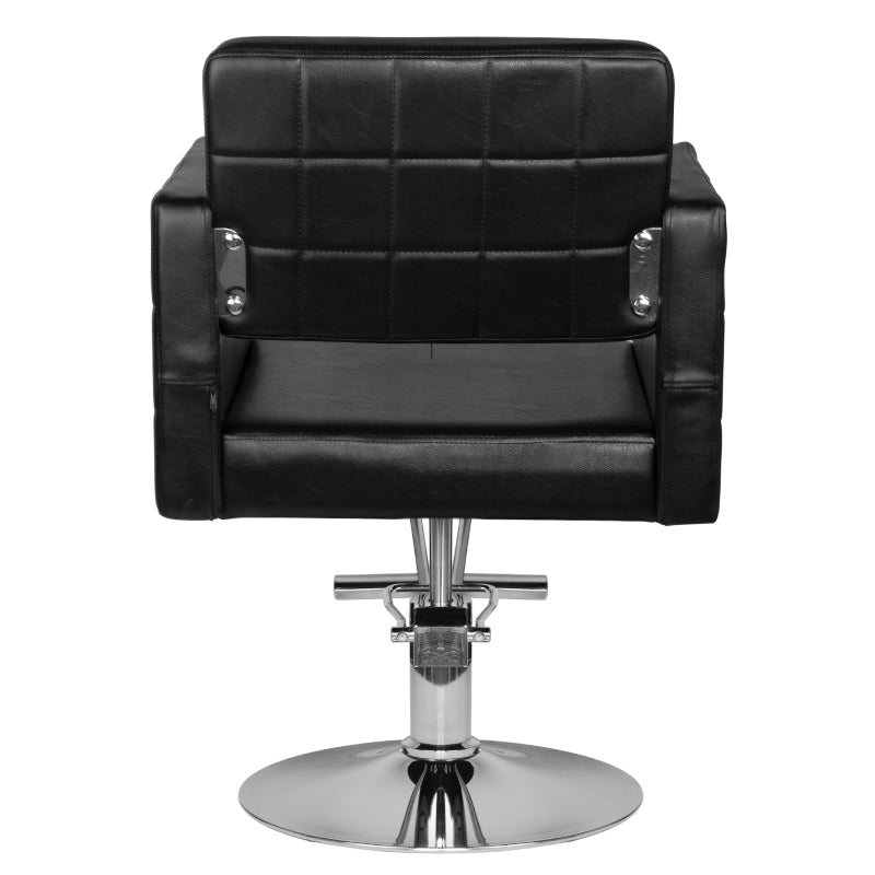 Black HAIR SYSTEM HS33 hairdressing chair with adjustable features, shown from a side angle in a salon setting.