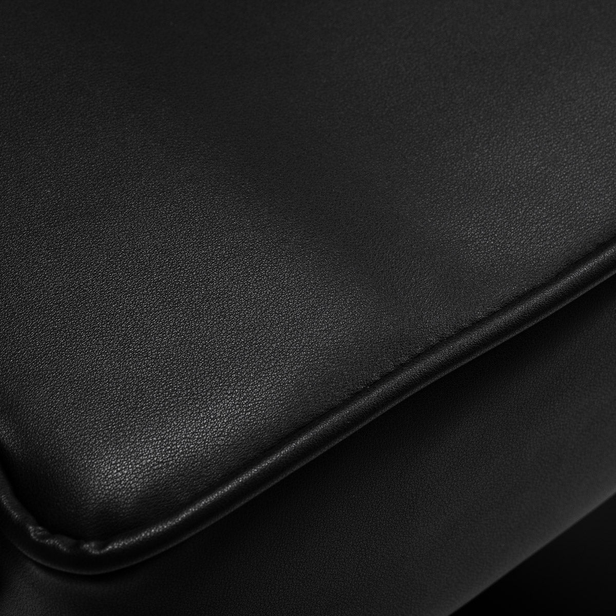 Black Hair System hairdressing chair in a professional salon setting with a sleek, modern design and adjustable features.
