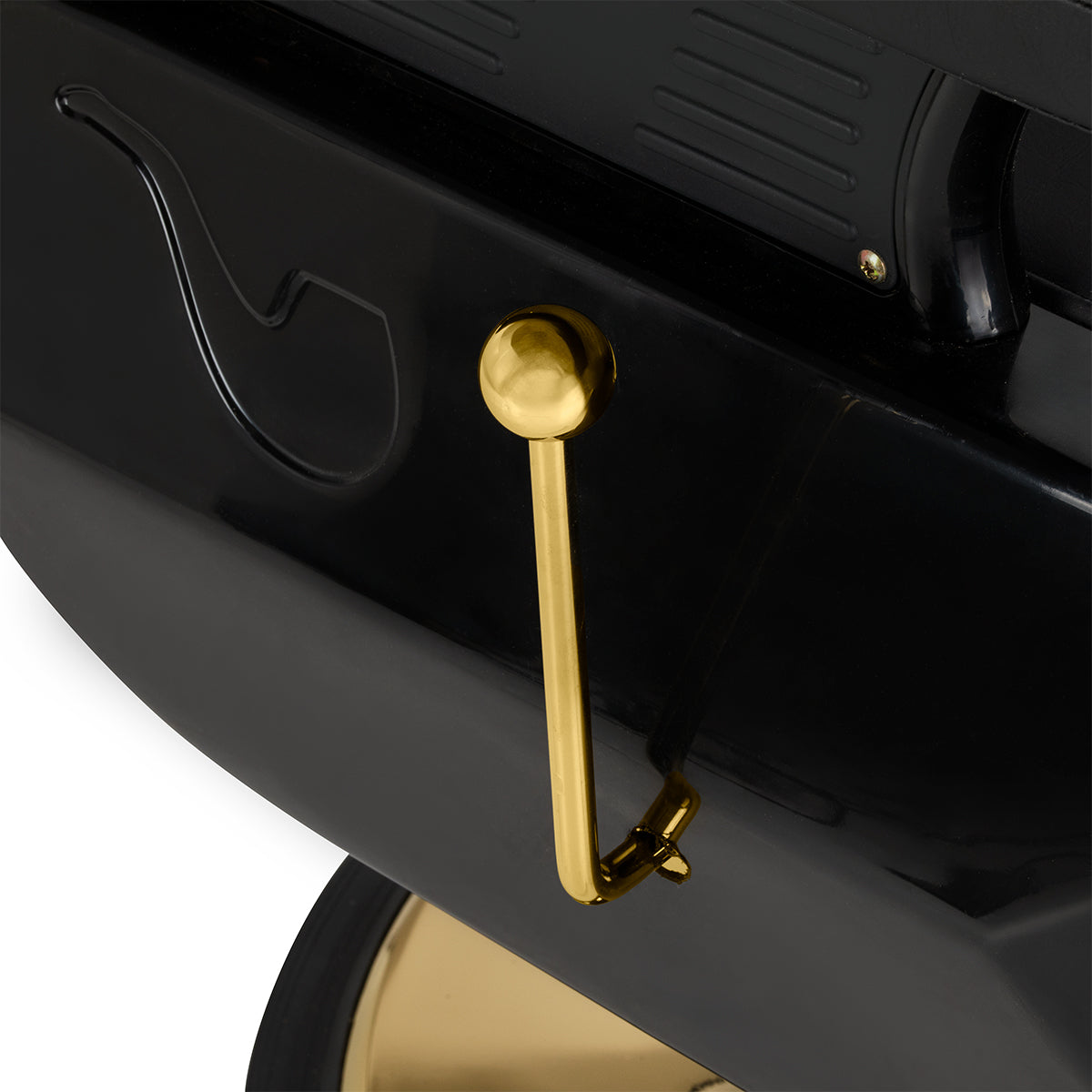 Black and gold HAIR SYSTEM barber chair, stylish barbershop furniture with adjustable features and cushioned seat.