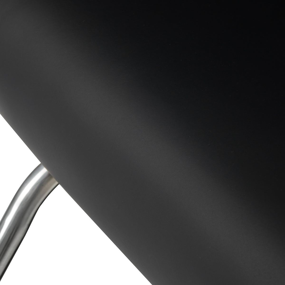Black Omega Andromeda hairdressing chair with adjustable height and cushioned seat, featuring a sleek modern design.