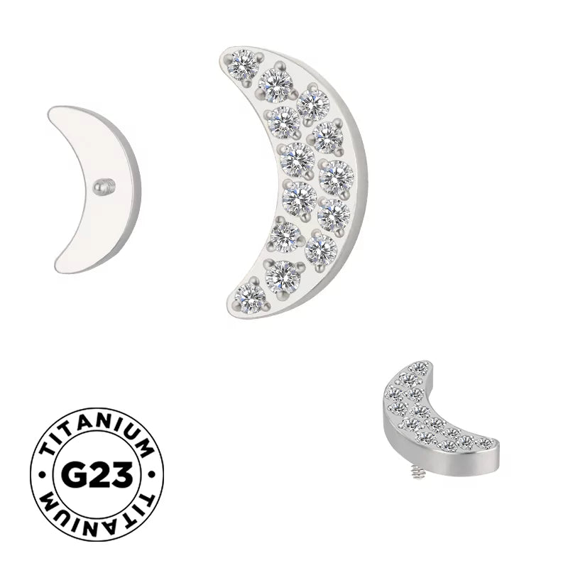 Titano žiedas su mėnulio formos akmenukais