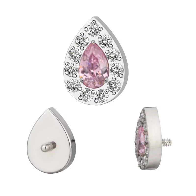 Titano žiedas su kriaušės formos akmenukais