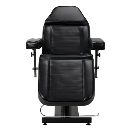 Black Pro Ink tattoo chair with cradle and adjustable armrests