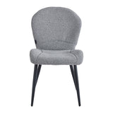 Grey sherpa reception chair with curved backrest and slim black legs