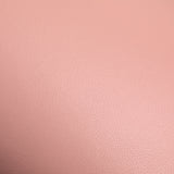 Pink Manicure Support Momo 7-M from MOMO, a beauty salon furniture piece with a cushioned surface for nail care.