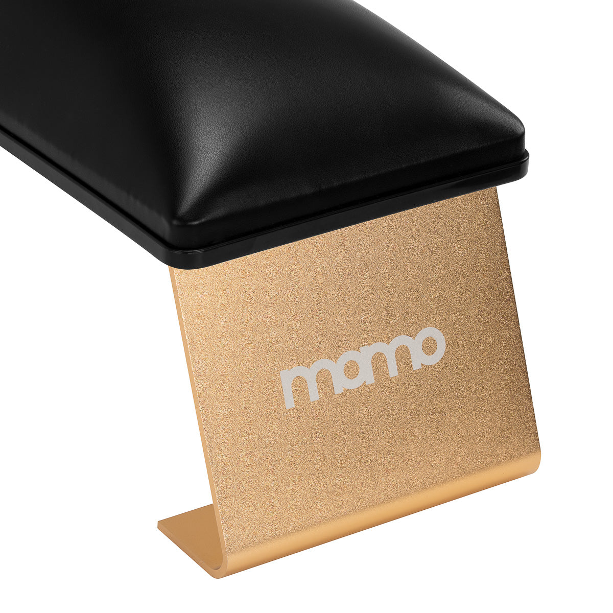 Black manicure support station from MOMO, a professional salon furniture piece with a sleek design for nail treatments.