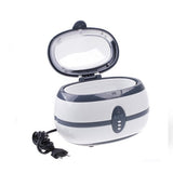 Professional Ultrasonic Cleaner VGT-800 by Beauty System with 600ml capacity, shown with stainless steel cleaning basket inside.