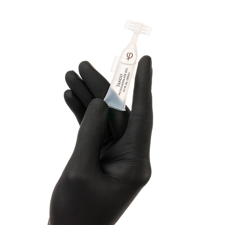 PhiAcademy Tango Microneedling Gel 3ml 10pcs — individual Tango ampoule held in a gloved hand