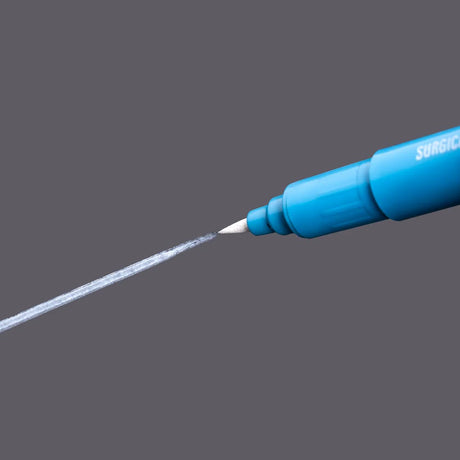 Saferly Fine Tip Surgical Skin Marker in white and violet with a fine tip, used for precise marking on skin during surgeries.