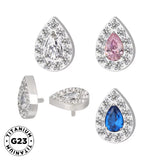 Titano žiedas su kriaušės formos akmenukais