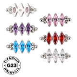 Titano žiedas su trimis karoliukais ir bezelio apvadu