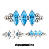 Titano žiedas su trimis karoliukais ir bezelio apvadu