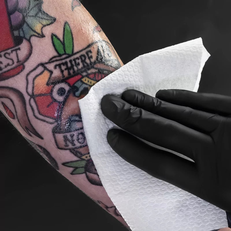 Unistar Nebula Tattoo Spray 240ml bottle with label, designed for tattoo aftercare and skin hydration.